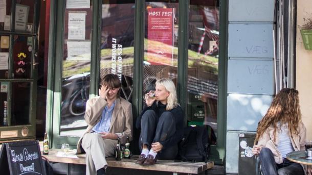 People sitting at café in Latin Quarter, Aarhus