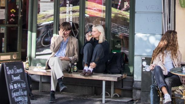 People sitting at café in Latin Quarter, Aarhus