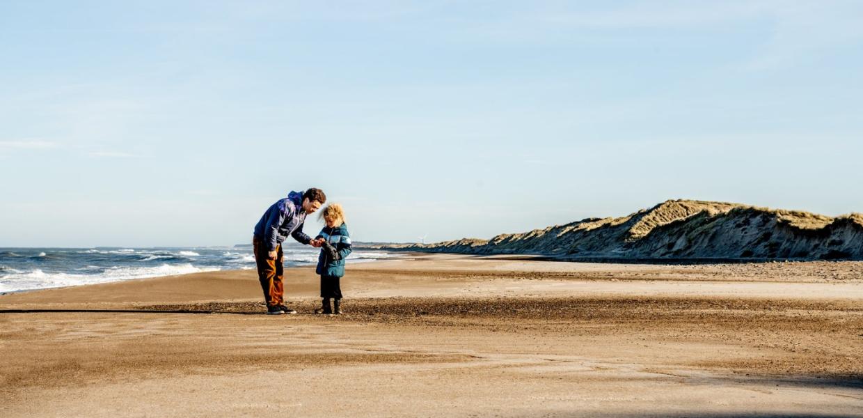 Family on the beach in Klitmøller, North Jutland