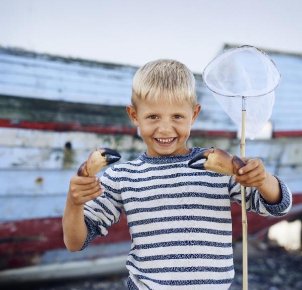 Pojke som fiskar på Thorup Strand, Nordjylland