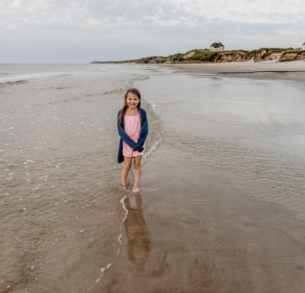 Child at Løkken strand beach, North Jutland
